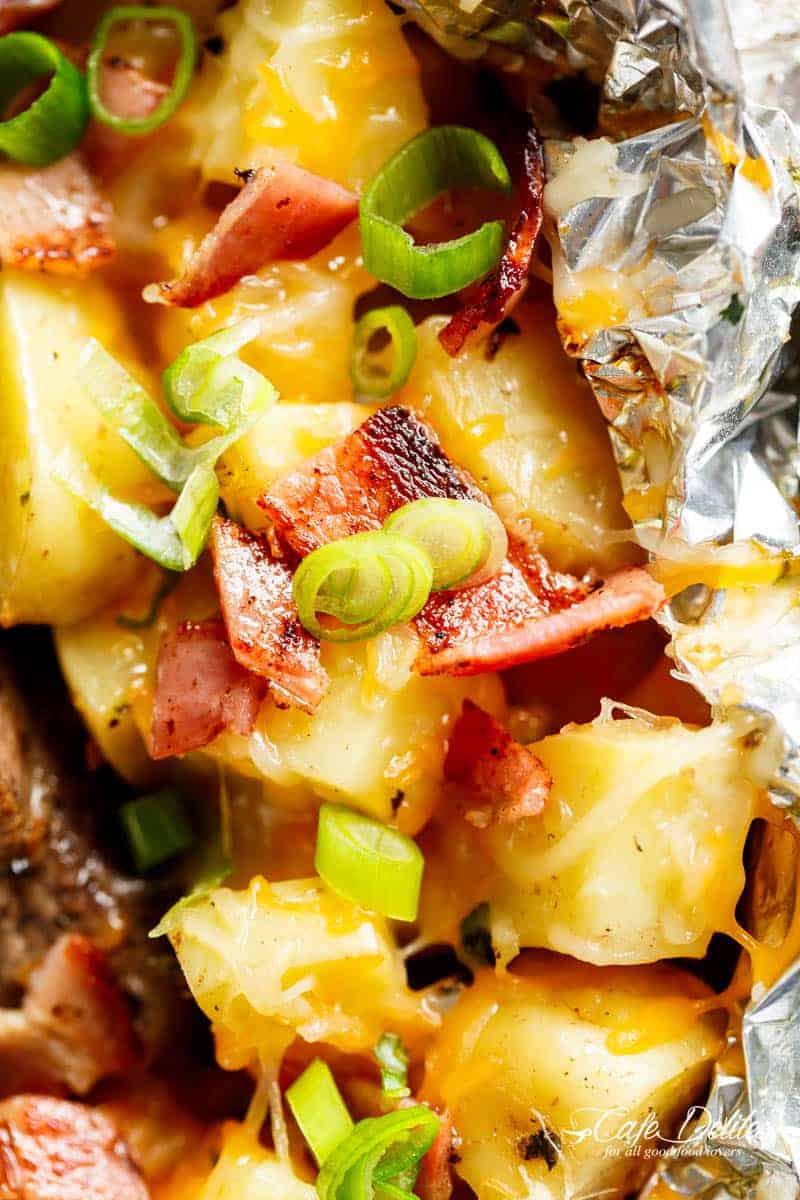 Image focuses on potato pieces from Steak & Cheesy Bacon Potato Hash Foil Packs