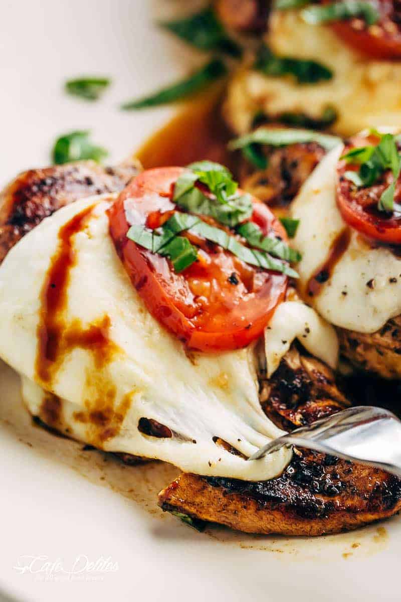 Zoom in image of Grilled Chicken Caprese pieces, with soft, creamy Buffalo Mozzarella slices