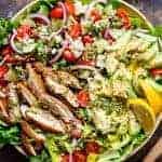 Top view of Pesto Grilled Chicken Avocado Salad using a pesto dressing to double as a marinade!