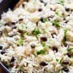 Black Beans & Rice is one of the best side recipes out there! Flavored with a squeeze of lime juice, garlic and spices, this rice recipe is a winner!
