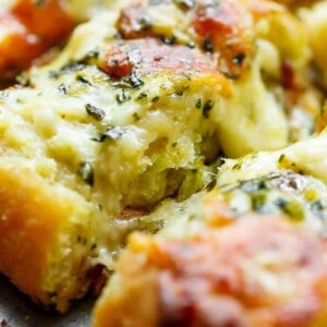 Zoom in image of a piece of Easy Cheesy Garlic Bread