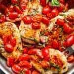 Grape tomatoes burst and cook through a buttery garlic sauce in the Garlic Tomato Basil Chicken