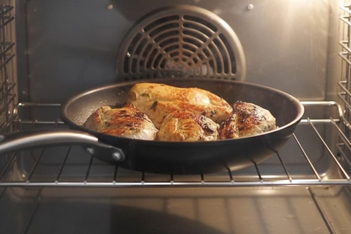 Placed the skillet with chicken in the oven.