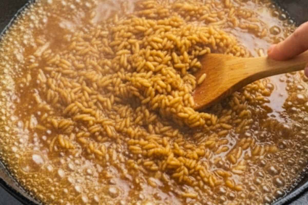 Allow the rice mixture to simmer uncovered for 5 minutes, stirring occasionally.