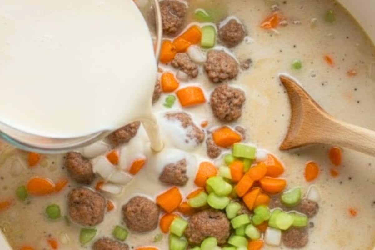 Stir in the evaporated milk, along with the milk and cornstarch mixture, until fully combined..