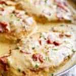 Delicious Creamy Beer Cheese Chicken With Crispy Bacon in a pan