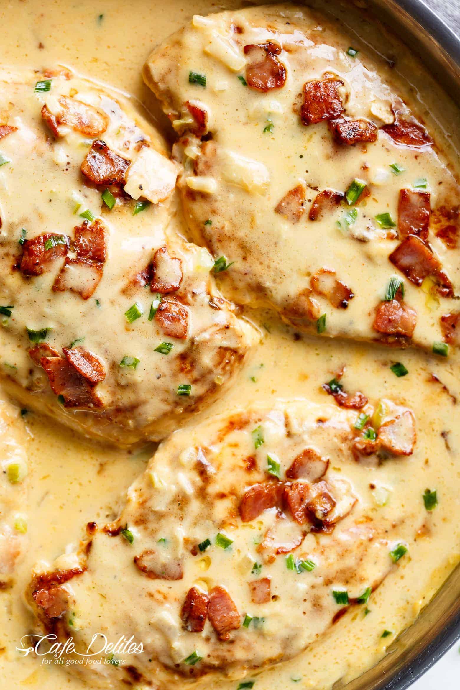 Creamy Beer Cheese Chicken With Crispy Bacon in a pan ready to enjoy