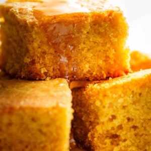 Easy Fluffy Buttermilk Cornbread with a hint of honey is the perfect side to chili's, soups or stews! Crunchy buttery edges with a soft and fluffy centre!