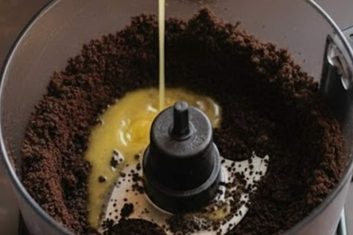 Pulse the Oreos in a food processor until they form fine crumbs, then add the melted butter.
