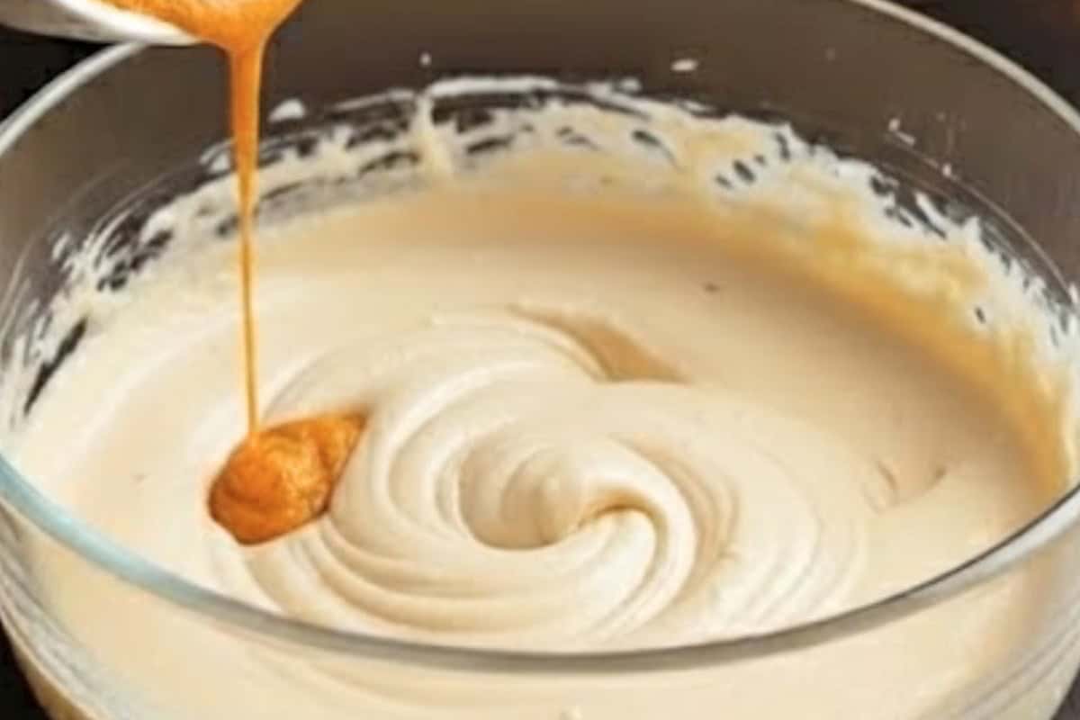 Add the eggs and pumpkin puree to the mixture and beat until the batter is fully combined