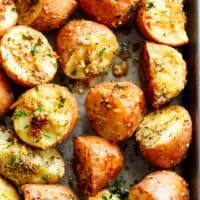 Herbs, garlic, and parmesan cheese are roasted together to make the best Crispy Browned Butter Parmesan Roasted Potatoes!