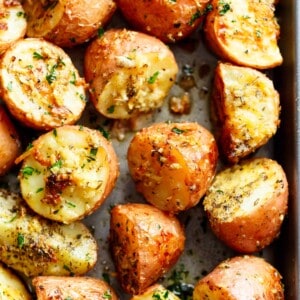 Herbs, garlic, and parmesan cheese are roasted together to make the best Crispy Browned Butter Parmesan Roasted Potatoes!