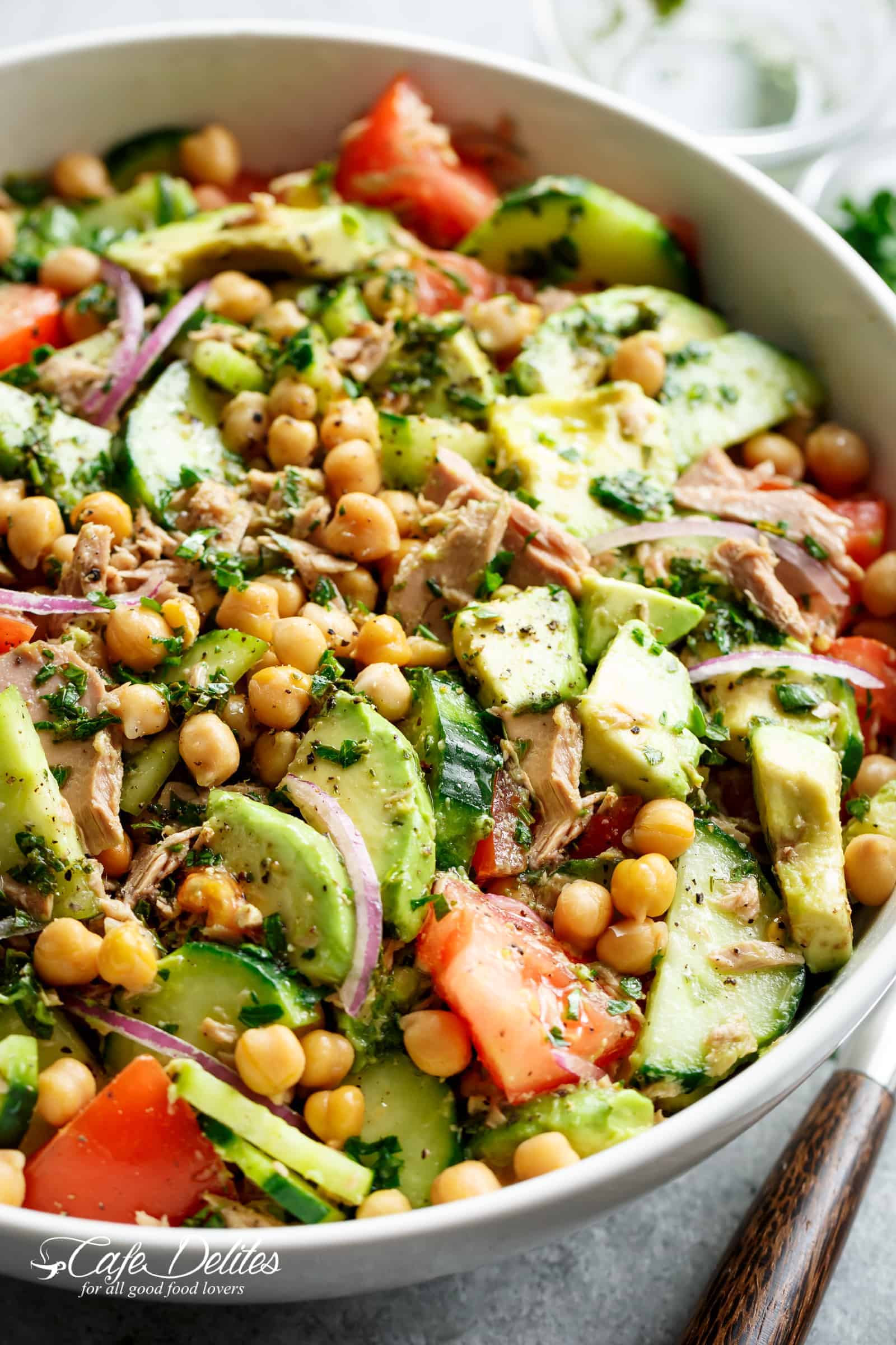 Avocado Chickpea Tuna Salad with a lemon dressing in a bowl