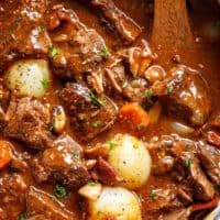 Tender fall apart chunks of beef simmered in a rich red wine gravy makes Julia Child's Beef
