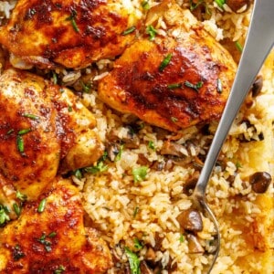 Oven Baked Chicken And Rice With Garlic Butter Mushrooms mixed through is winner of a chicken dinner!