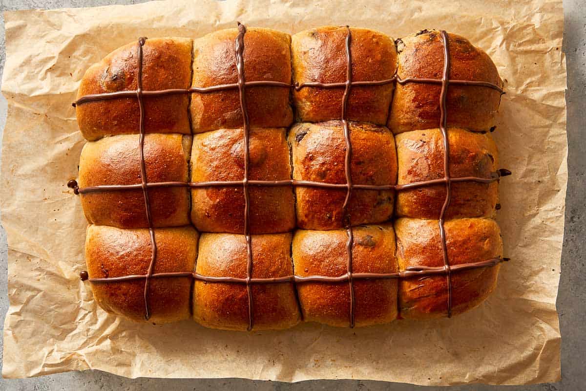baked chocolate hot cross buns with chocolate crosses and glaze