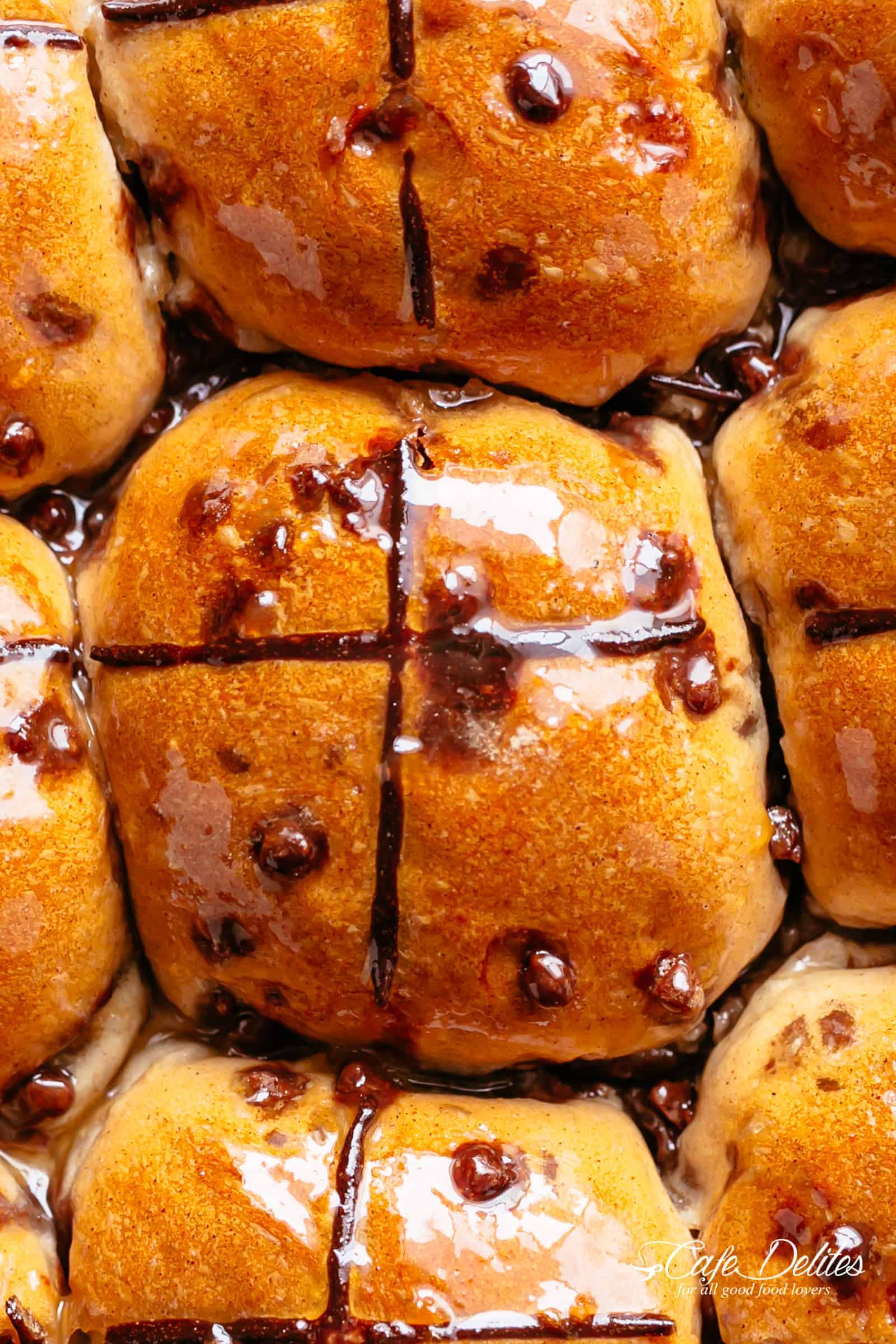 Fluffy and fragrant homemade hot cross buns filled with melted chocolate chips are better than store bought!