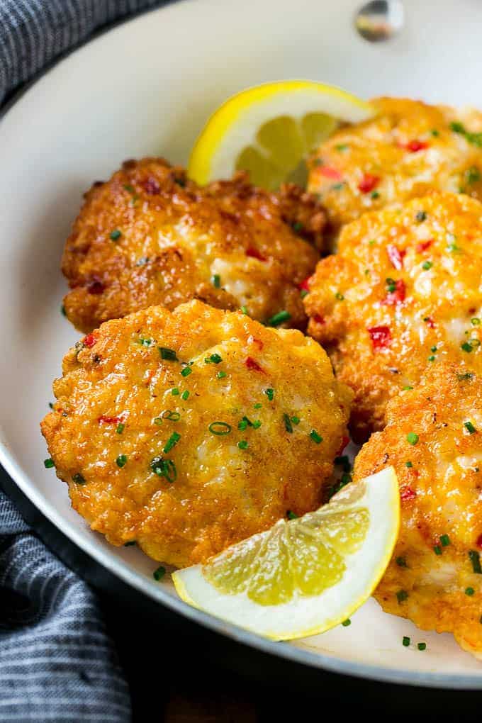 These easy shrimp cakes are loaded with veggies and herbs and pan seared to golden brown perfection in a bowl