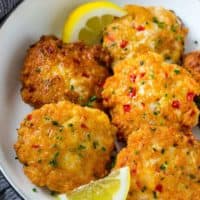These easy shrimp cakes are loaded with veggies and herbs and pan seared to golden brown perfection in a bowl