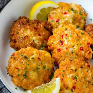 These easy shrimp cakes are loaded with veggies and herbs and pan seared to golden brown perfection in a bowl
