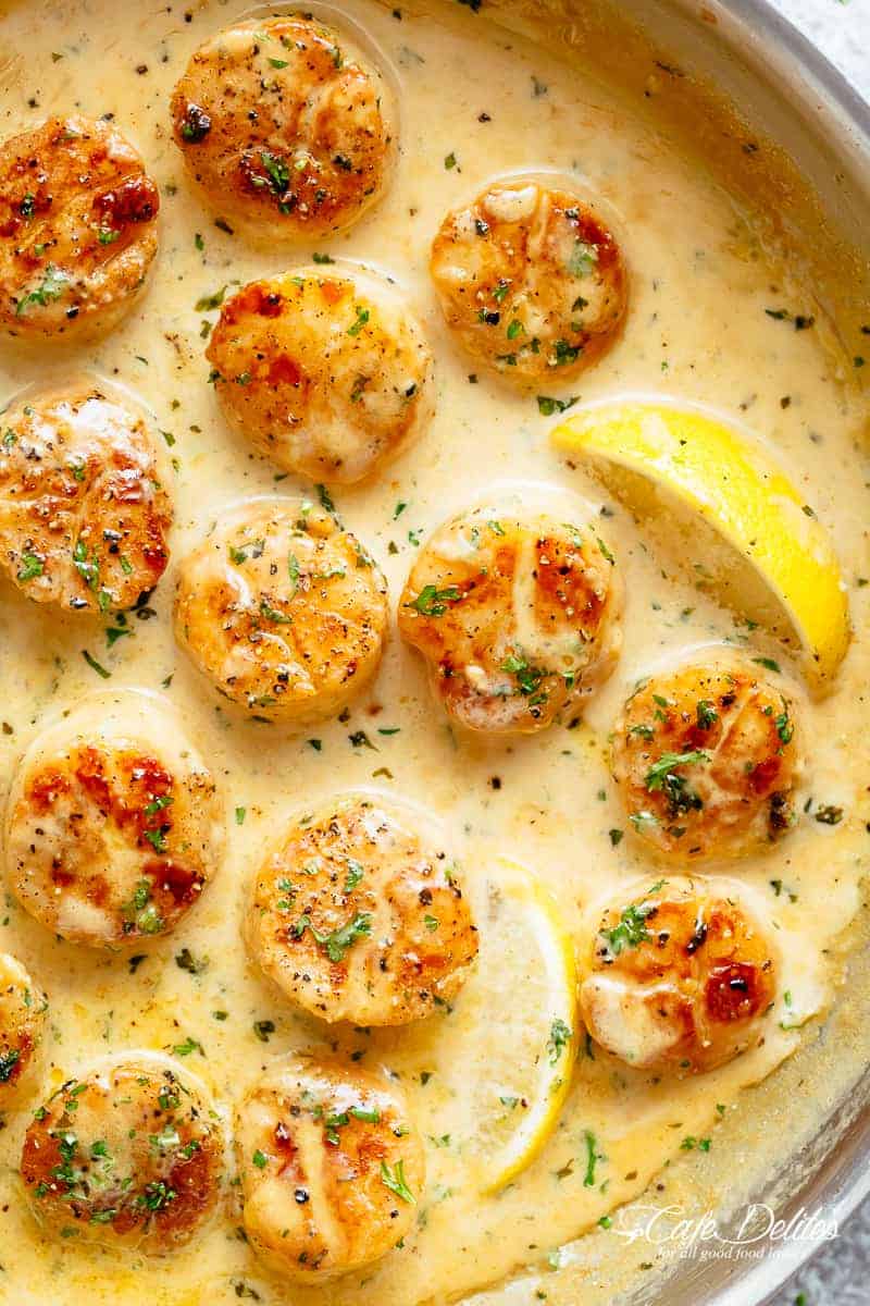 Creamy Garlic Scallops soaked into A silky, creamy garlic sauce with a hint of lemon coats crispy, buttery scallops