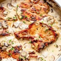 Seared Pork Chops with a creamy garlic and herb mushroom sauce