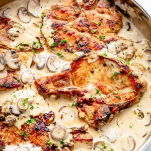 Seared Pork Chops with a creamy garlic and herb mushroom sauce