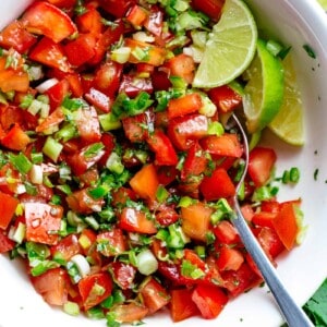 Pico De Gallo is a super easy to make fresh tomato salsa you can serve with anything! From tortilla chips to tacos, enchiladas or Carne Asada
