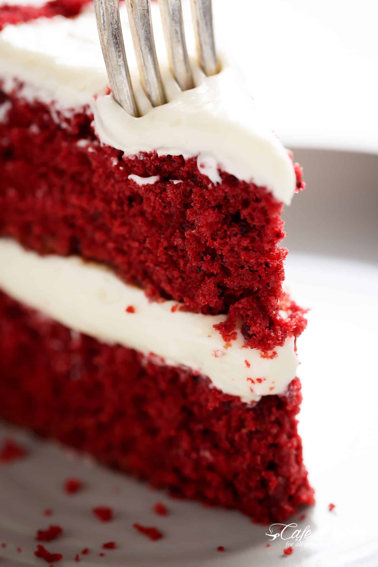 Red velvet cake | cafedelites.com Side view of a slice of Red Velvet Cake