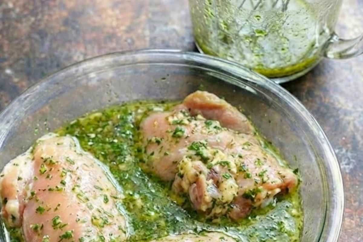 Add the chicken to the dish and coat well