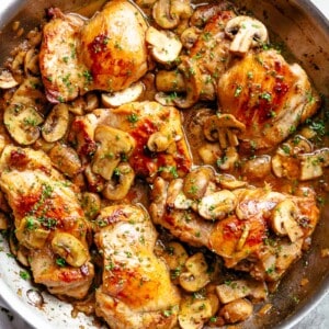 Golden seared chicken thighs with buttery garlic mushroom sauce with a sprinkle of herbs Served over rice, pasta, mashed potatoes or lower carb options like mashed cauliflower or zucchini noodles!