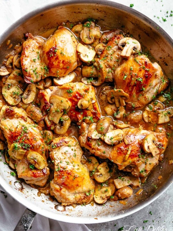 Golden seared chicken thighs with buttery garlic mushroom sauce with a sprinkle of herbs Served over rice, pasta, mashed potatoes or lower carb options like mashed cauliflower or zucchini noodles!