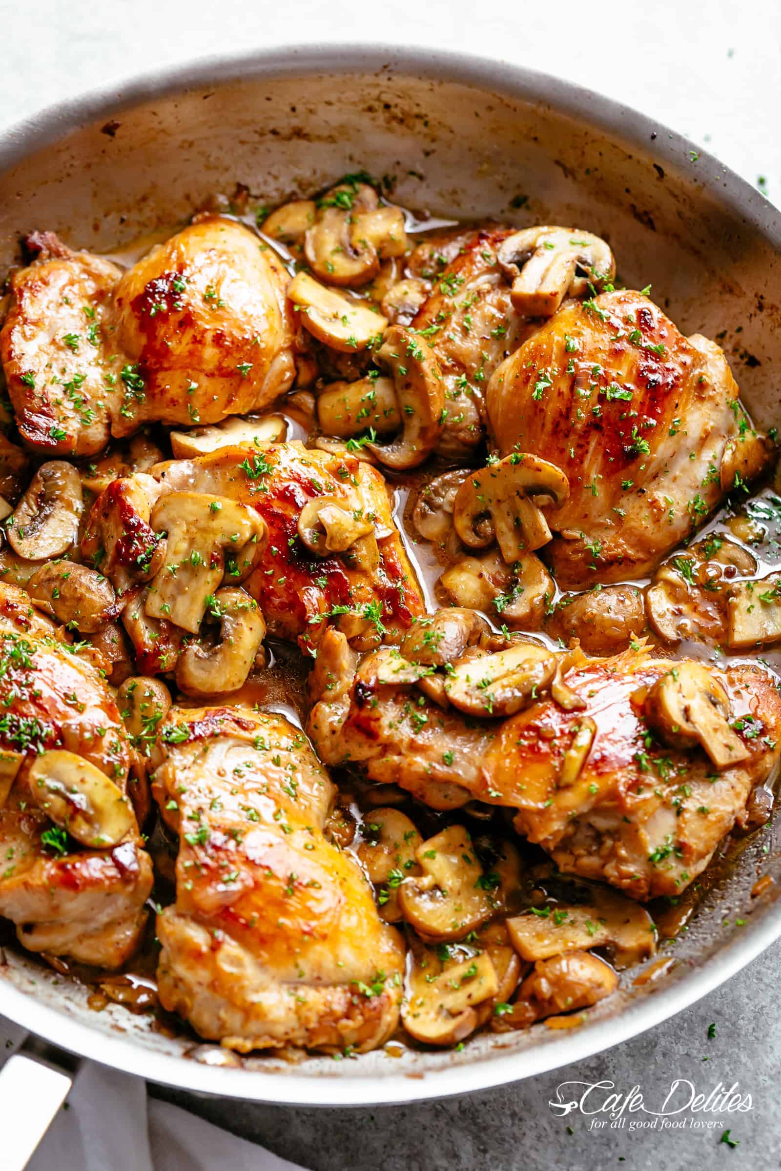 Golden seared chicken thighs in a delicious, buttery garlic mushroom sauce with a sprinkle of herbs is THE weeknight dinner everyone raves about! Serve over rice, pasta, mashed potatoes OR lower carb options like mashed cauliflower or zucchini noodles!