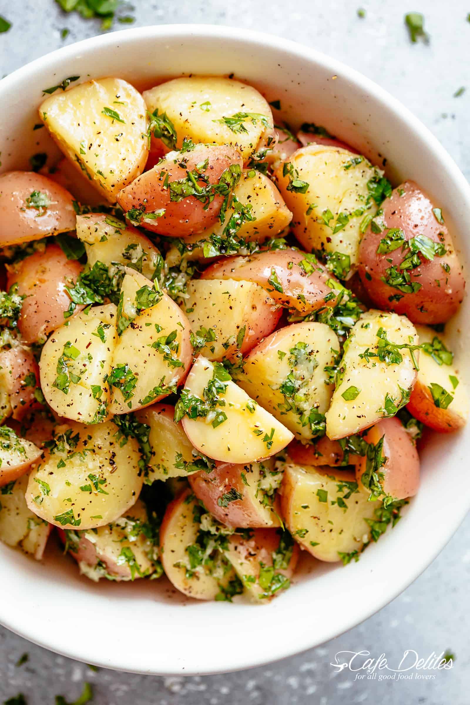 Garlicky Herb Red Potato Salad | cafedelites.com Garlicky Herb Red Potato Salad is ridiculously easy to make and packed with flavor in a bowl