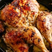 Tender and juicy Lemon Garlic Roast Chicken with crispy, rich and flavorful skin, so much flavor and easy to find ingredients! Garlic, onions, lemons, olive oil, fresh herbs and a splash of white wine (optional) make this one amazing roast chicken recipe! You'll be so surprised at how moist the meat is!
