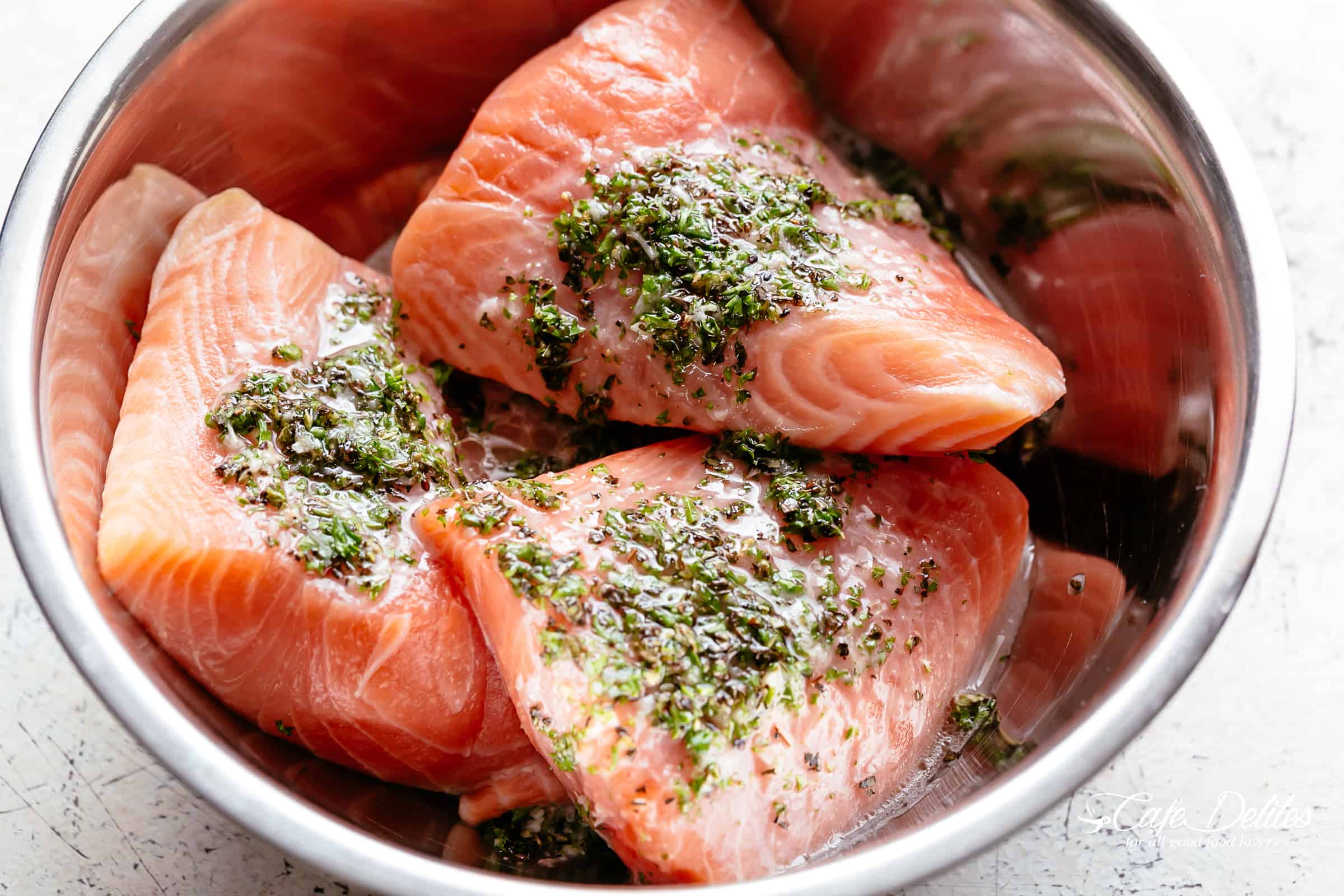 Salmon Salad | cafedelites.com Raw Lemon Herb Avocado Salmon Salad ready to marinate
