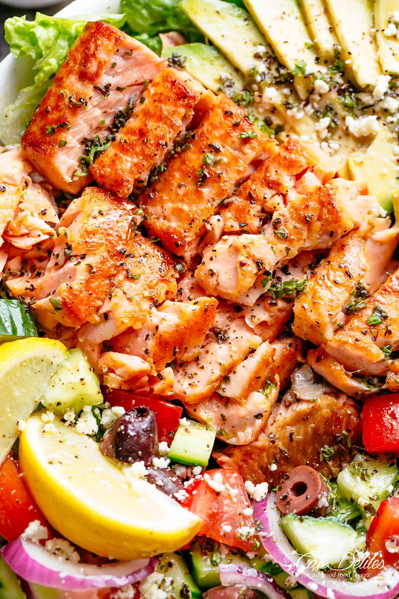 Salmon Salad | cafedelites.com Avocado Salmon Salad with an incredible lemon herb Mediterranean dressing! Loaded with cucumber, olives, tomatoes and feta cheese in a pan