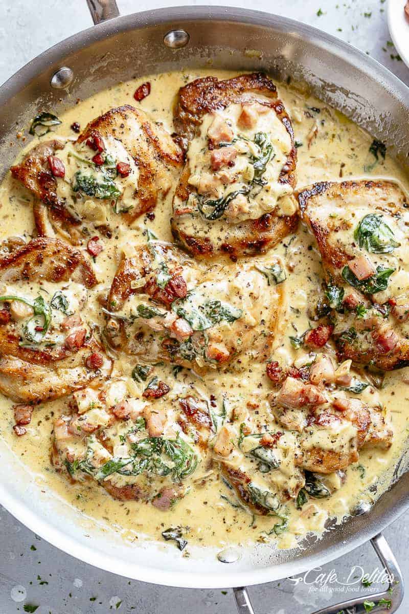 Creamy Dijon Chicken in a garlic Dijon sauce with bacon and spinach! | cafedelites.com Crispy seared Chicken Thighs in a smooth and creamy garlic Dijon sauce with Bacon pieces and Spinach