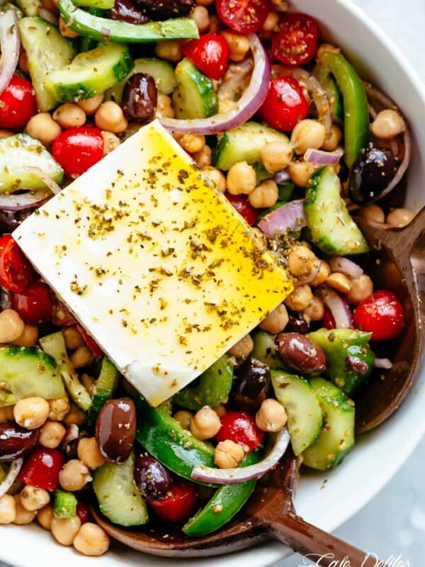 Greek Chickpea Salad with an authentic greek salad dressing in a bowl