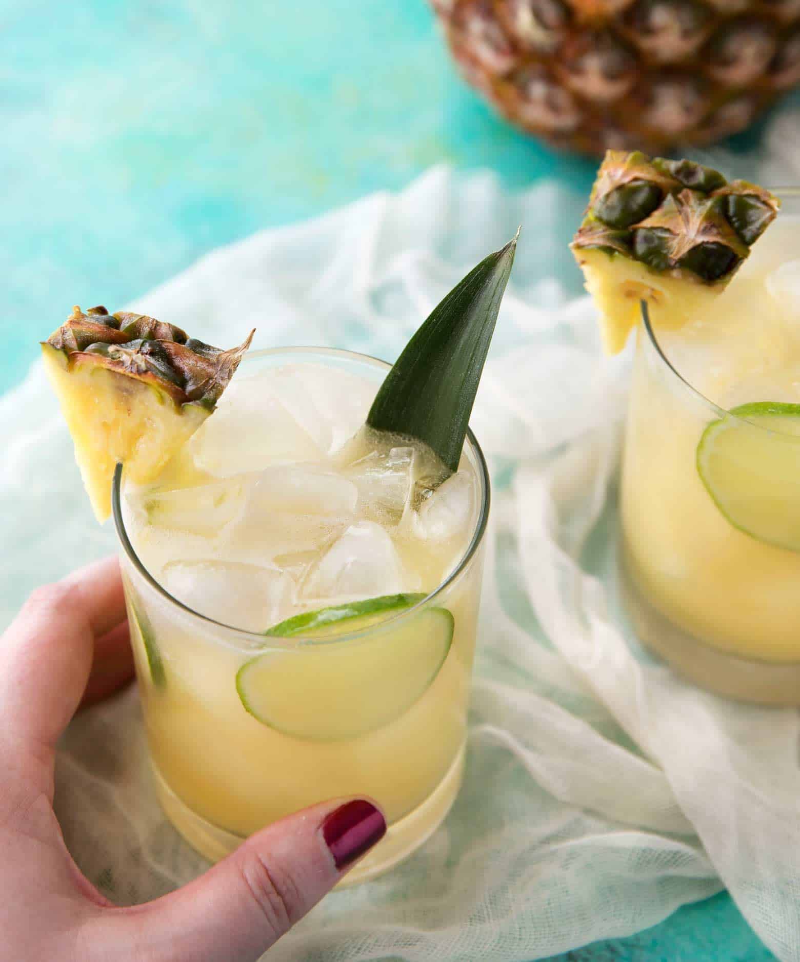Pineapple Rum Punch is a refreshing cocktail to enjoy in your own home! | cafedelites.com Top view image of Tropical Pineapple Rum Punch!