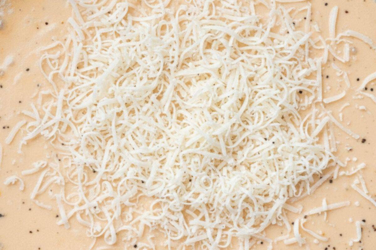 Lower heat to low medium and stir in the cream; bring to a simmer. Add parmesan to melt and season with salt and pepper to taste.