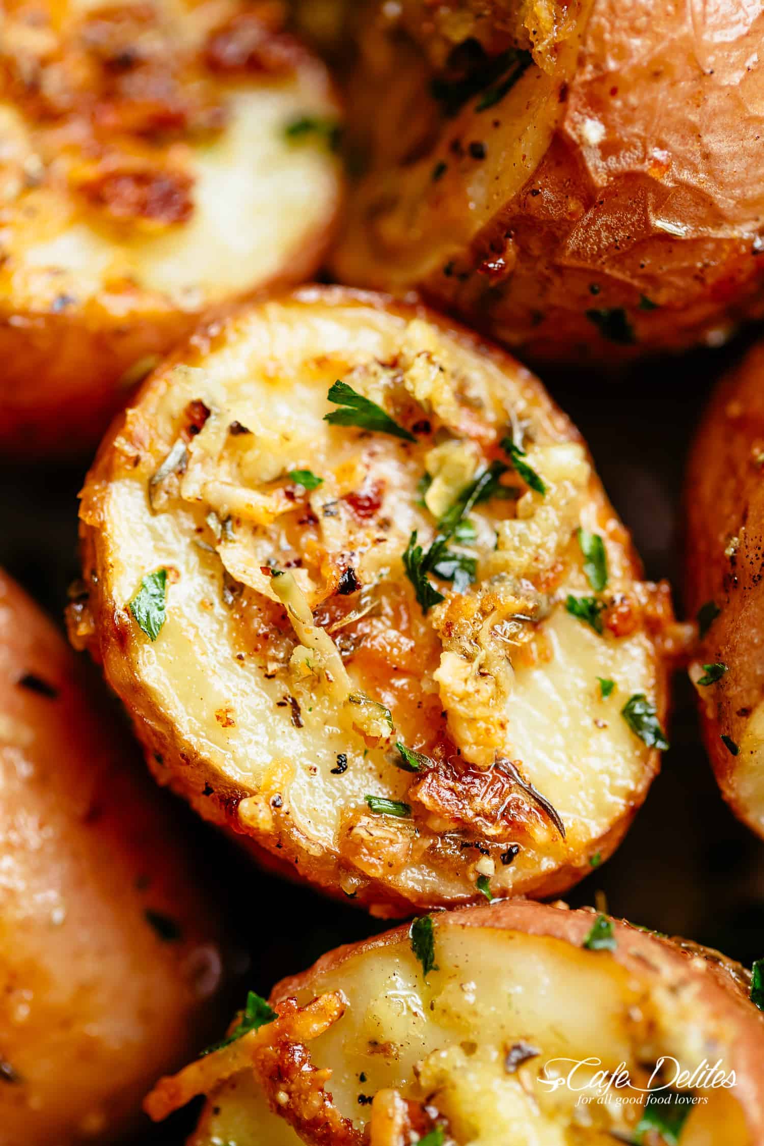 Herbs, garlic, and parmesan cheese are roasted together to make the best Crispy Browned Butter Parmesan Roasted Potatoes!