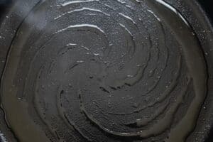 Heating the pan with oil.