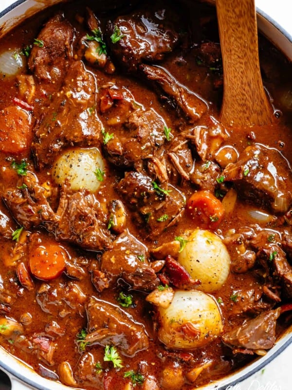 Tender fall apart chunks of beef simmered in a rich red wine gravy makes Julia Child's Beef