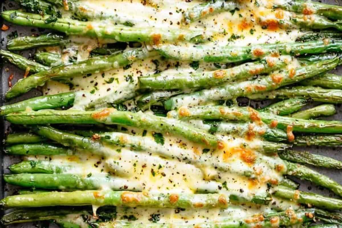 Sprinkle the shredded mozzarella evenly over the beans.