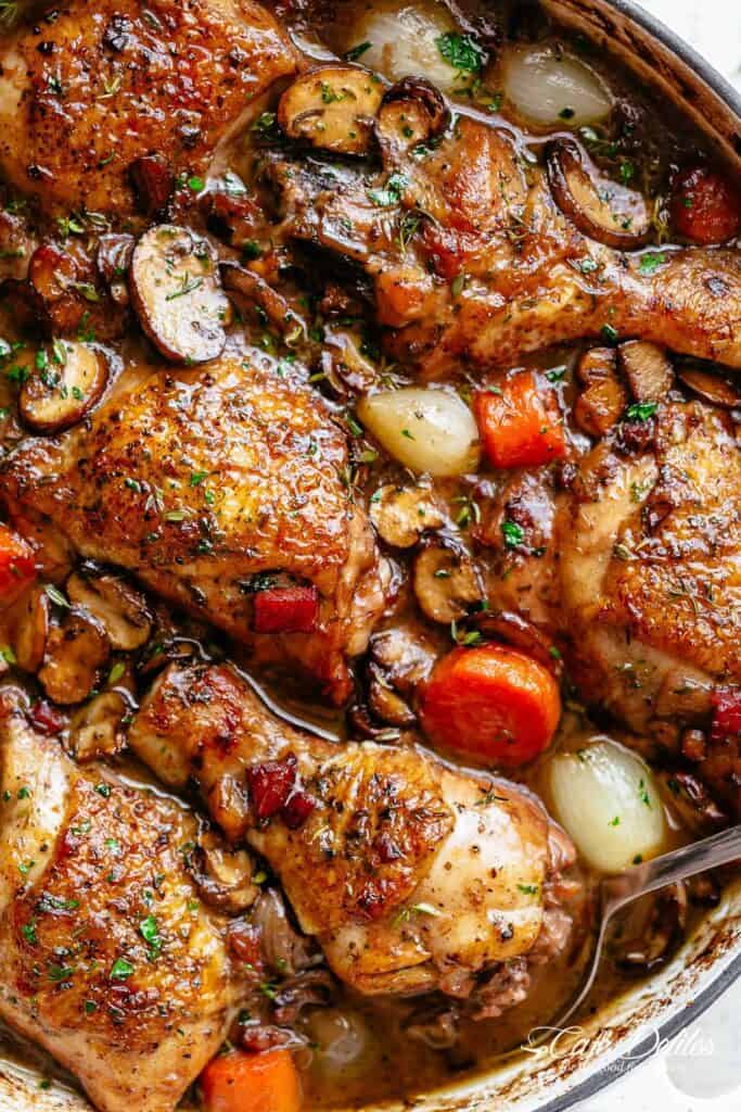 Coq Au Vin, or chicken in wine, is a popular classic French Chicken Stew made with crispy chicken pieces!
