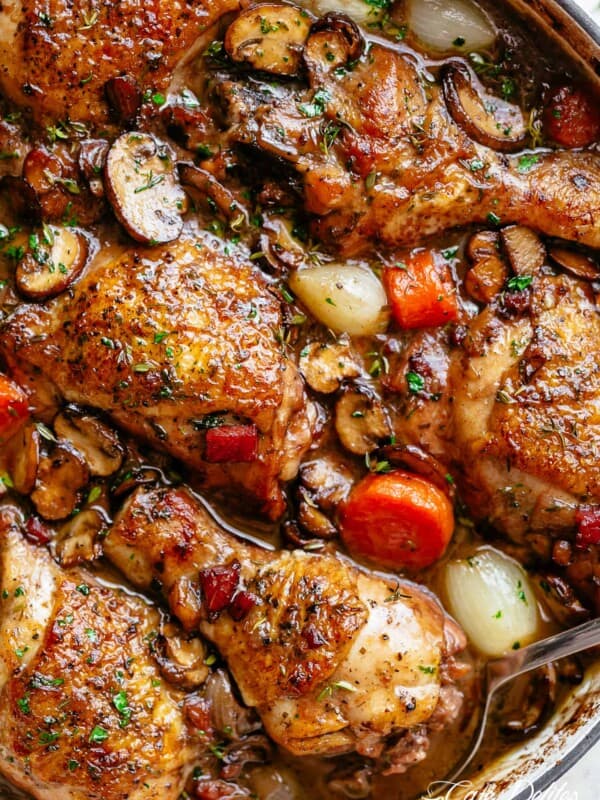 Coq Au Vin, or chicken in wine, is a popular classic French Chicken Stew made with crispy chicken pieces!