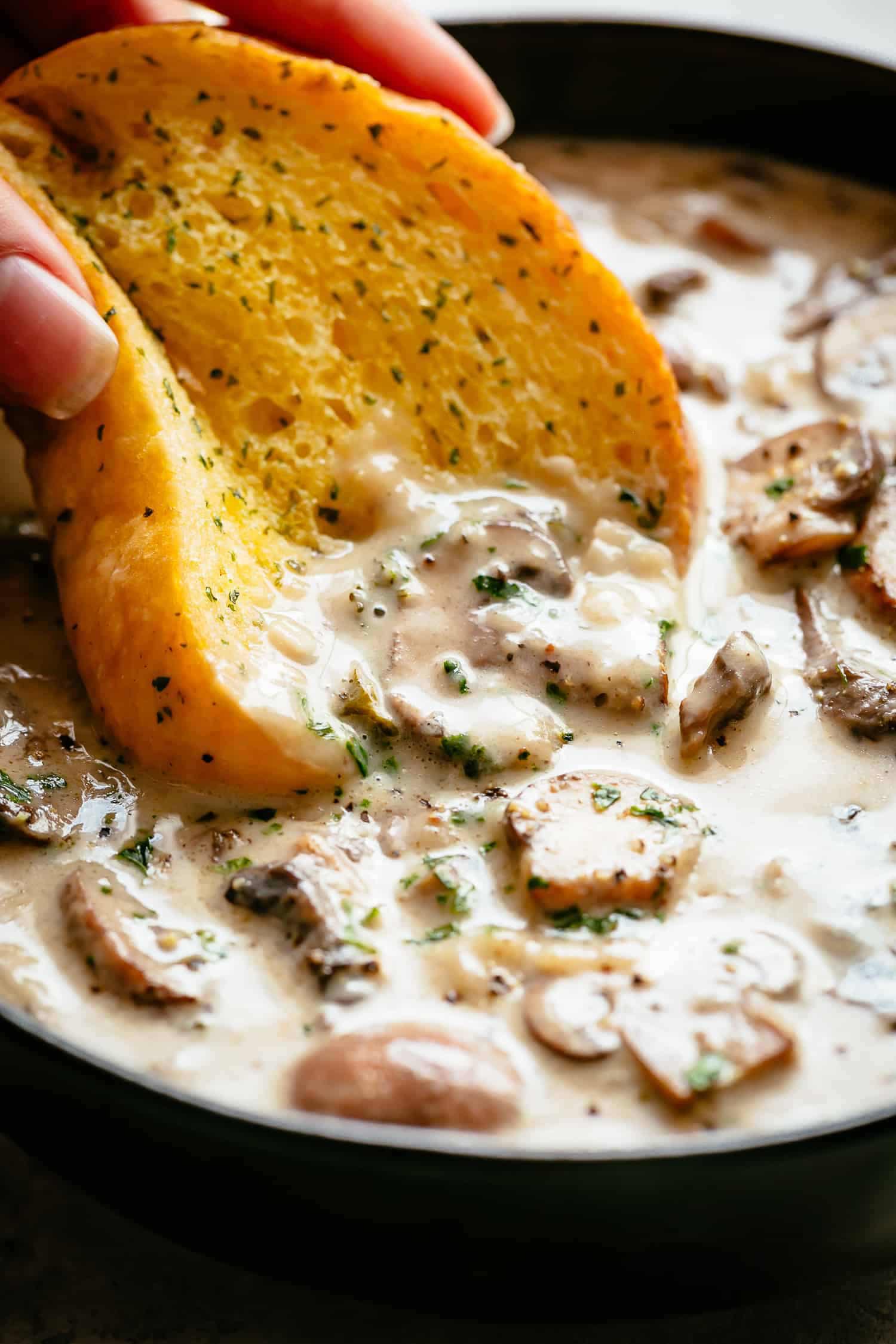 Homemade Cream of Mushroom Soup with garlic bread