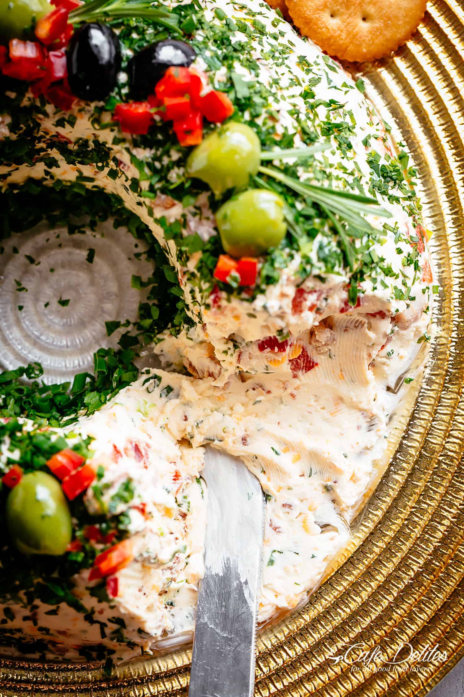 A holiday masterpiece! Top view of Bacon onion and cheese dip cheese ball wreath