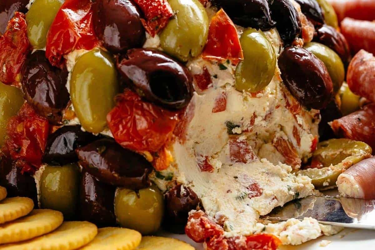 Serve immediately or chill until ready to serve, alongside crackers, rolled salami, and prosciutto
